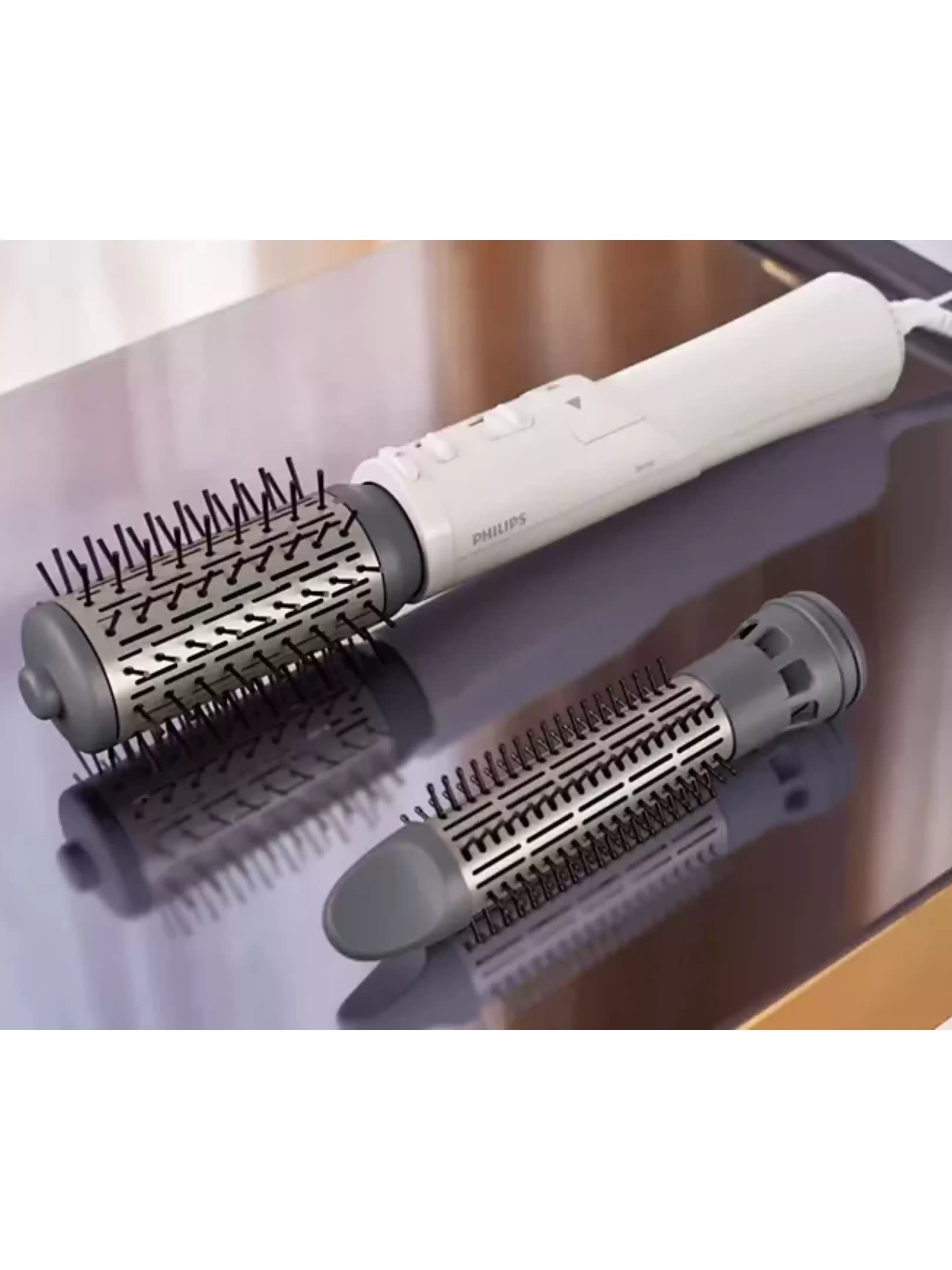 Фен-щетка Philips BHA710/00 (1000 Вт, вращающаяся щётка,  диаметр - 30 мм, 50 мм, генератор ионов, насадок - 3 шт, шнур - 1,8 м)-6